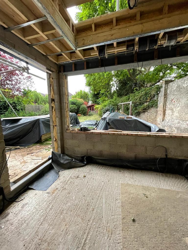 Concrete subfloor preparation, residential renovation in London