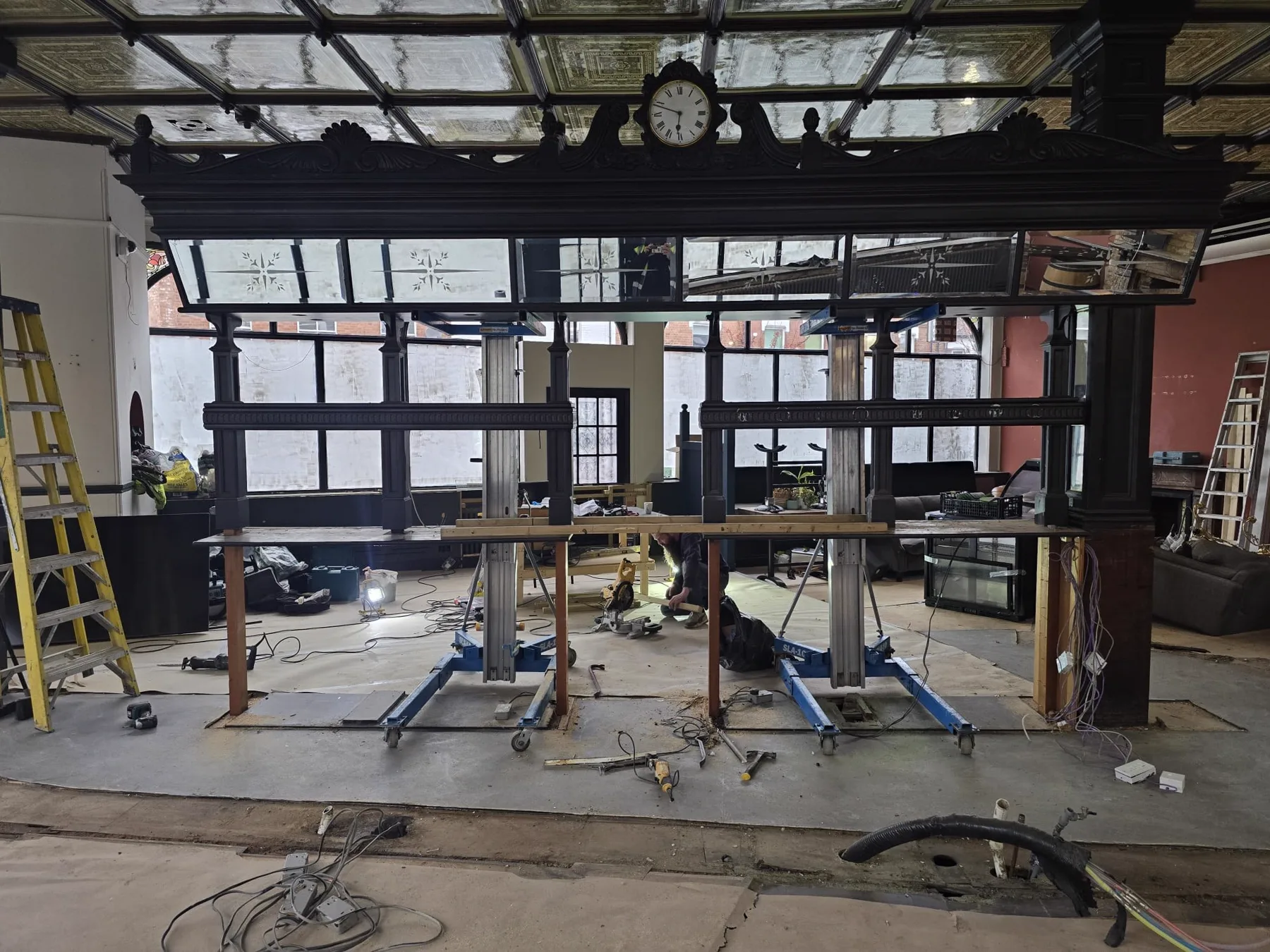 Original Victorian gantry lifted on specialist hydraulic equipment during refurbishment